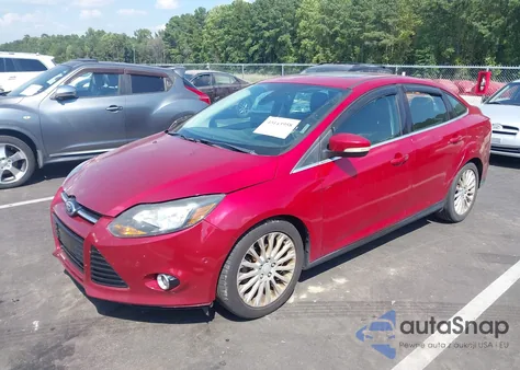 2012 Ford Focus Titanium z USA, uszkodzony, nr VIN 1FAHP3J21CL258049